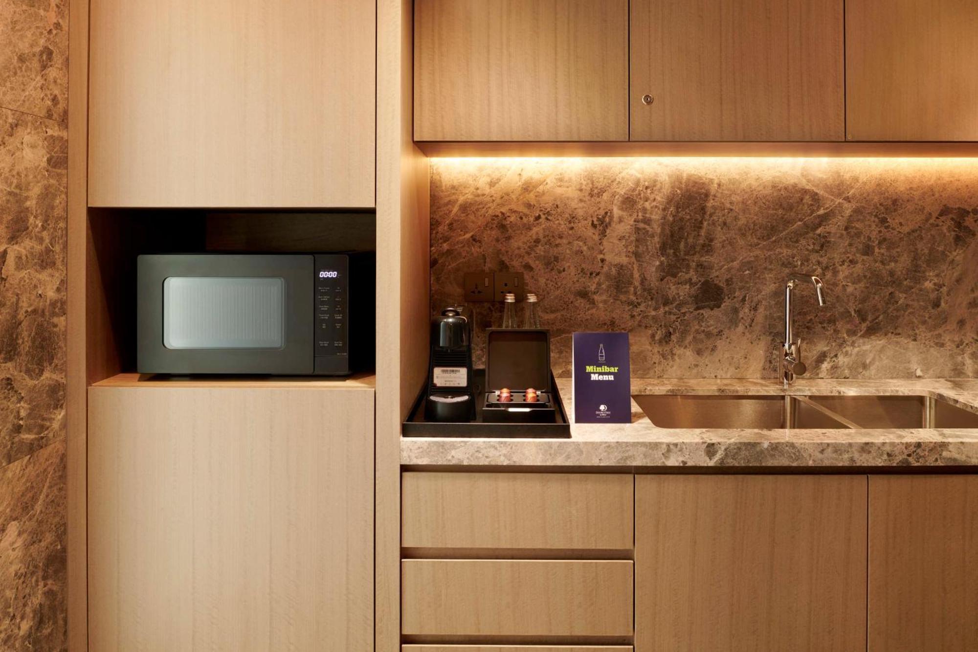Doubletree By Hilton Shah Alam I-City Zewnętrze zdjęcie A microwave oven in a kitchen